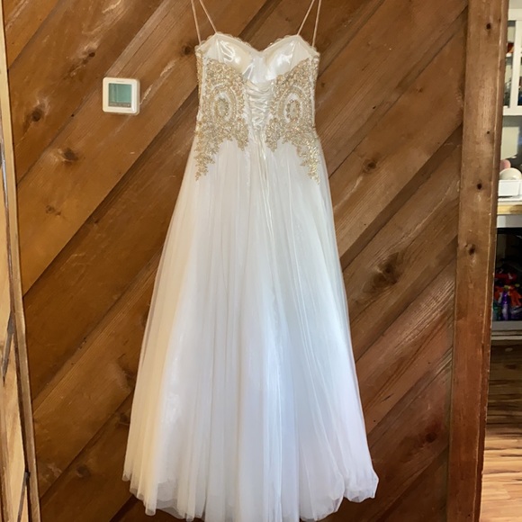 This is a white/off white and gold  TLC SAY YES TO THE PROM dress - Picture 2 of 5